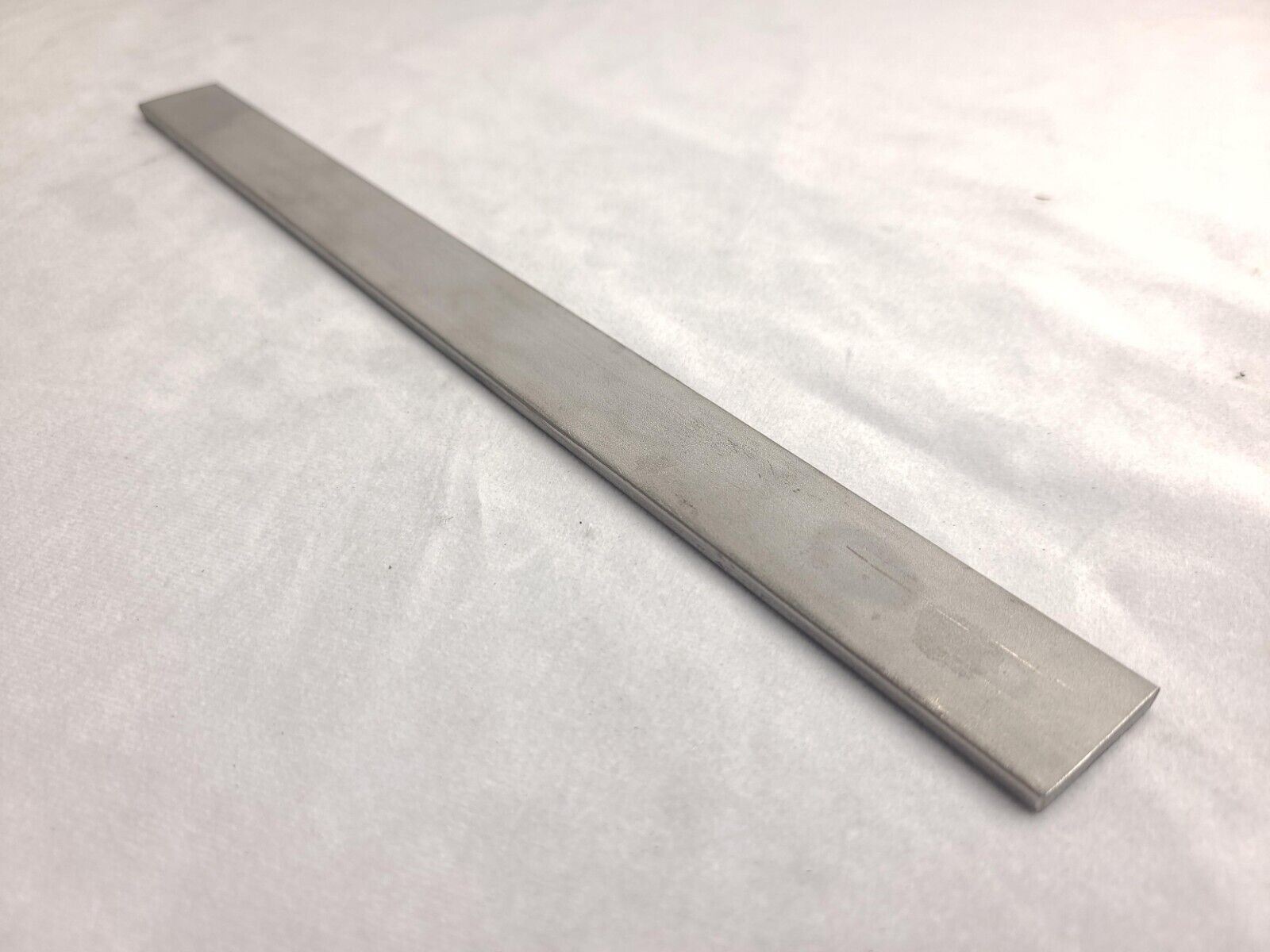thumbnail interactive-video image 1 of 304 Stainless Steel Flat Bar – 1/8” X 3/4” X 6” – Metal Remnants Inc, Made In USA 1 of 3